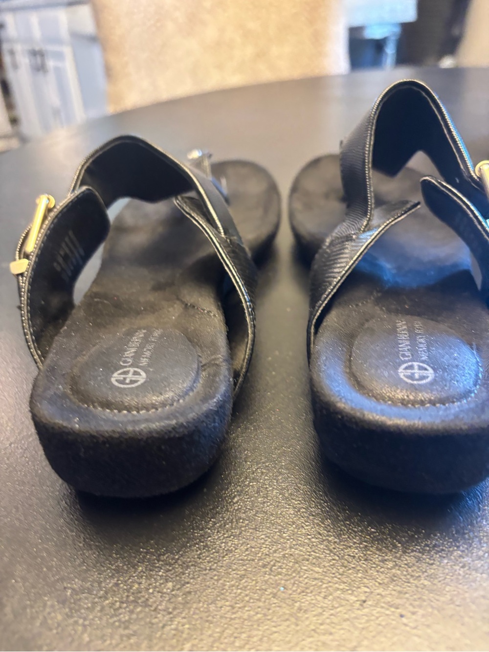 Gianni Bini Black Slip-On Sandals with Gold Buckle Accent